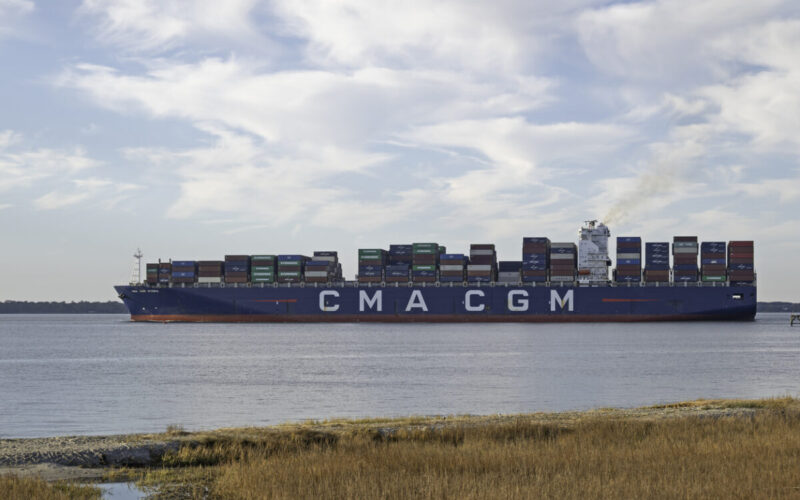 Charleston, SC, USA - February 01, 2025: Hydra, a 347-meter Neo Panamax class container ship owned by CMA CGM and flagged to Bahamas, sails out of Charleston Harbor.